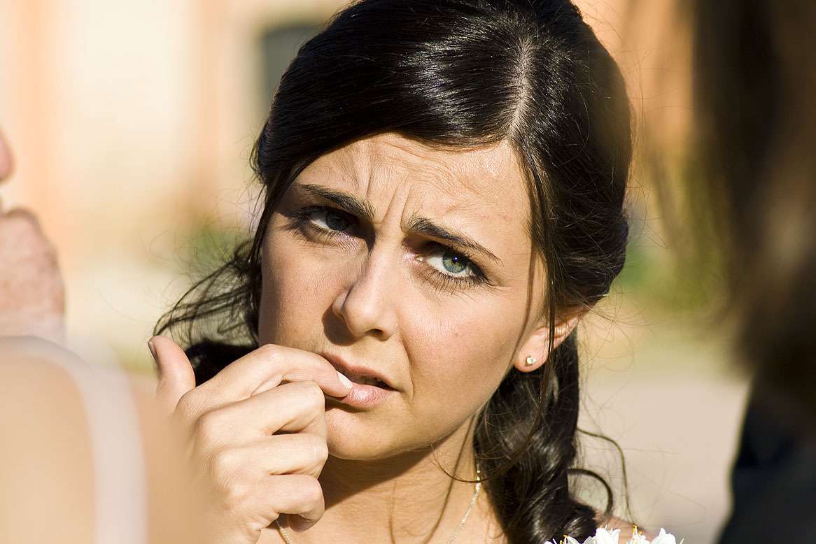 Anxious Woman Biting Her Nails
